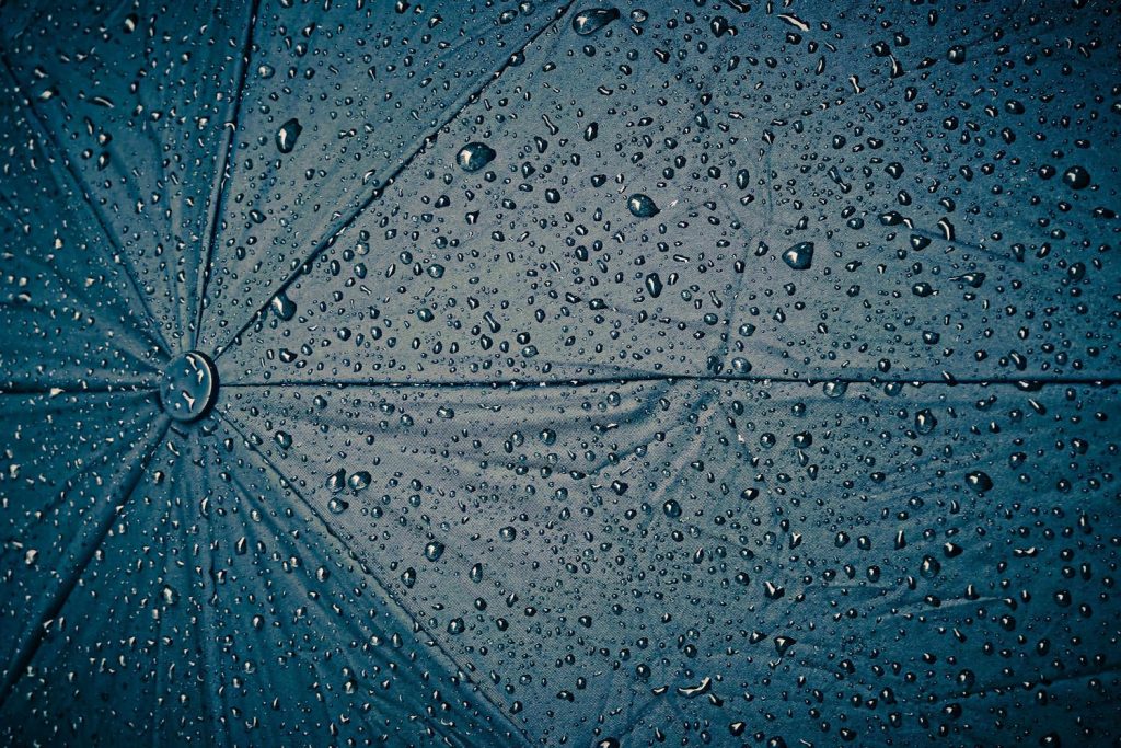Wet umbrella with raindrop