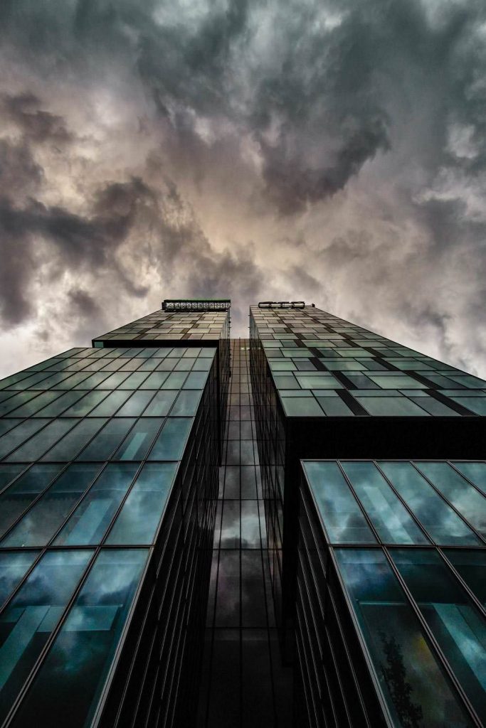 Cloudy  skyscraper windows building