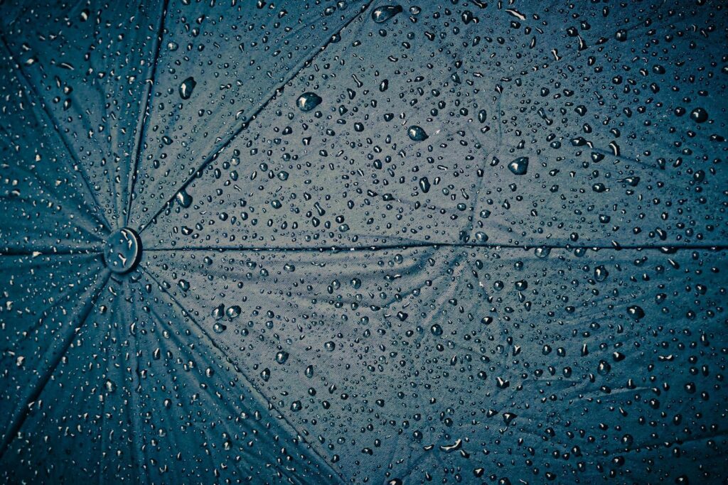 
									Wet umbrella with raindrop